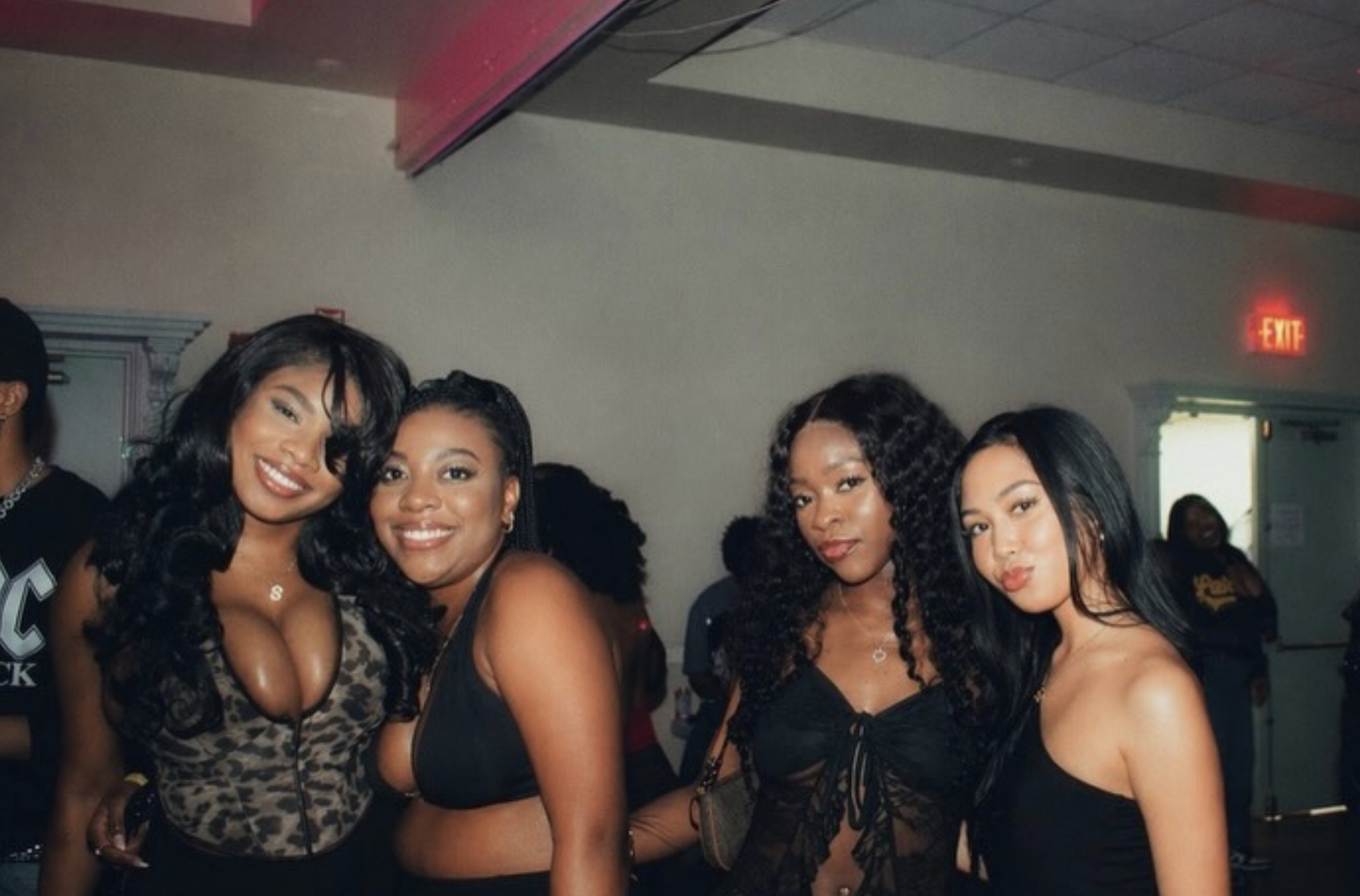 Group of guests posing at Aura Salad